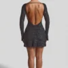 Rochie mini Grazina cu spate decupat și croi în A, cu ornamente, în negru Rochie mini Grazina cu spate decupat și croi în A, cu ornamente, în negru