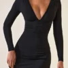 Rochie mini Jessa din modal, cu volane și decolteu adânc, în formă de A, de culoare neagră Rochie mini Jessa din modal, cu volane și decolteu adânc, în formă de A, de culoare neagră