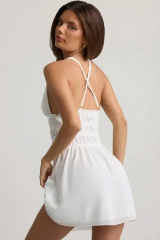 Rochie mini Kaelis cu decolteu adânc și spate încrucișat, albă Rochie mini Kaelis cu decolteu adânc și spate încrucișat, albă