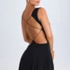 Rochie mini Kalista cu decupaj adânc, de culoare neagră