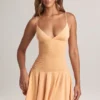 Rochie mini Kelbie din modal cu volane, croi în A, în culoarea piersică Rochie mini Kelbie din modal cu volane, croi în A, în culoarea piersică