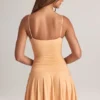 Rochie mini Kelbie din modal cu volane, croi în A, în culoarea piersică Rochie mini Kelbie din modal cu volane, croi în A, în culoarea piersică