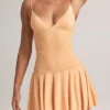 Rochie mini Kelbie din modal cu volane, croi în A, în culoarea piersică Rochie mini Kelbie din modal cu volane, croi în A, în culoarea piersică