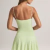 Rochie mini Kelbie din modal, cu volane, în formă de A, în verde salvie Rochie mini Kelbie din modal, cu volane, în formă de A, în verde salvie