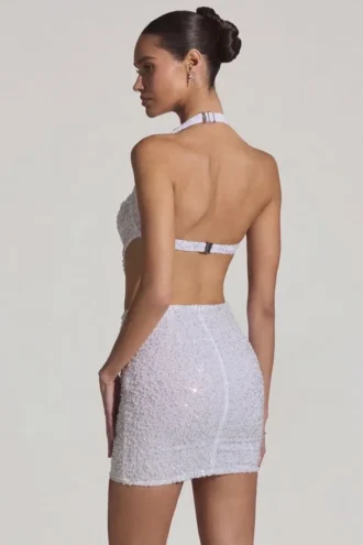 Rochie mini Lucia cu decupaje și gât halter, în alb Rochie mini Lucia cu decupaje și gât halter, în alb