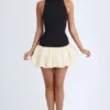 Rochie mini Nabila cu guler înalt, talie coborâtă și tiv bufant, din modal, în culoarea negru Rochie mini Nabila cu guler înalt, talie coborâtă și tiv bufant, din modal, în culoarea negru