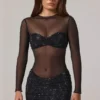 Rochie mini Noel cu guler înalt, mâneci lungi și decorațiuni transparente, în culoarea negru