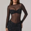 Rochie mini Noel cu guler înalt, mâneci lungi și decorațiuni transparente, în culoarea negru