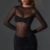 Rochie mini Noel cu guler înalt, mâneci lungi și decorațiuni transparente, în culoarea negru