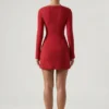 Rochie mini roșie cu decolteu în formă de inimă, mâneci lungi și croi în A, model Corinne Rochie mini roșie cu decolteu în formă de inimă, mâneci lungi și croi în A, model Corinne