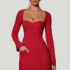 Rochie mini roșie cu decolteu în formă de inimă, mâneci lungi și croi în A, model Corinne Rochie mini roșie cu decolteu în formă de inimă, mâneci lungi și croi în A, model Corinne