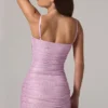 Rochie mini roz cu decupaje și volane Neréa