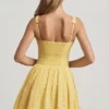 Rochie mini Sabina cu croi în A, broderie englezească și detaliu fundă, în galben pastel Rochie mini Sabina cu croi în A, broderie englezească și detaliu fundă, în galben pastel