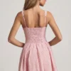 Rochie mini Sabina cu detaliu fundă, croi în A, cu buline roz Rochie mini Sabina cu detaliu fundă, croi în A, cu buline roz