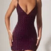 Rochie mini semi-transparentă cu decolteu adânc și ornamente Ronja, în culoarea violet închis Rochie mini semi-transparentă cu decolteu adânc și ornamente Ronja, în culoarea violet închis