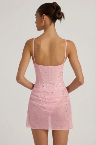 Rochie mini semi-transparentă, drapată, cu corset și ornamente, model Connie, în roz Rochie mini semi-transparentă, drapată, cu corset și ornamente, model Connie, în roz