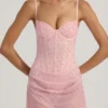Rochie mini semi-transparentă, drapată, cu corset și ornamente, model Connie, în roz Rochie mini semi-transparentă, drapată, cu corset și ornamente, model Connie, în roz