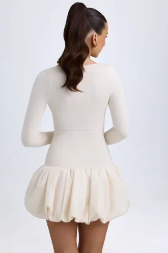 Rochie mini Tallou din modal, cu talie coborâtă și tiv bufant, în culoarea ivoriu Rochie mini Tallou din modal, cu talie coborâtă și tiv bufant, în culoarea ivoriu