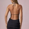 Rochie mini Tarryn cu volane, decolteu halter și spate decupat, în negru Rochie mini Tarryn cu volane, decolteu halter și spate decupat, în negru
