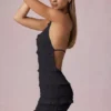 Rochie mini Tarryn cu volane, decolteu halter și spate decupat, în negru Rochie mini Tarryn cu volane, decolteu halter și spate decupat, în negru