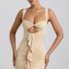 Rochie mini Zivanka din jersey elastic, cu decupaje și volane, în culoarea Buttercream