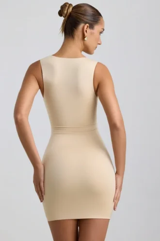 Rochie mini Zivanka din jersey elastic, cu decupaje și volane, în culoarea Buttercream Rochie mini Zivanka din jersey elastic, cu decupaje și volane, în culoarea Buttercream