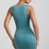 Rochie mini Zivanka din jersey elastic, cu decupaje și volane, în culoarea verde mare Rochie mini Zivanka din jersey elastic, cu decupaje și volane, în culoarea verde mare
