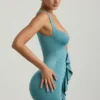 Rochie mini Zivanka din jersey elastic, cu decupaje și volane, în culoarea verde mare Rochie mini Zivanka din jersey elastic, cu decupaje și volane, în culoarea verde mare