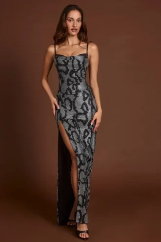 Rochie Velia cu guler tip cowl și decupaje, cu imprimeu șarpe argintiu Rochie Velia cu guler tip cowl și decupaje, cu imprimeu șarpe argintiu