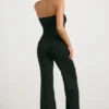 Salopetă bandeau din tricot gros, cu croi evazat, în culoarea neagră Salopetă bandeau din tricot gros, cu croi evazat, în culoarea neagră