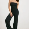 Salopetă bandeau din tricot gros, cu croi evazat, în culoarea neagră Salopetă bandeau din tricot gros, cu croi evazat, în culoarea neagră