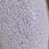 Salopetă Coralena cu decupaje și ornamente, în culoarea albă Salopetă Coralena cu decupaje și ornamente, în culoarea albă