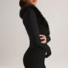 Salopetă corset Nesta cu bordură din blană artificială, negru Salopetă corset Nesta cu bordură din blană artificială, negru