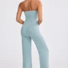 Salopetă cu bretele subțiri și croi evazat din tricot gros, culoare verde-albăstrui prăfuit Salopetă cu bretele subțiri și croi evazat din tricot gros, culoare verde-albăstrui prăfuit
