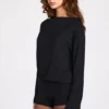 Salopetă Dara cu mâneci lungi și spate decupat, din modal, în culoarea negru Salopetă Dara cu mâneci lungi și spate decupat, din modal, în culoarea negru