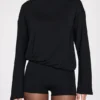 Salopetă Dara cu mâneci lungi și spate decupat, din modal, în culoarea negru Salopetă Dara cu mâneci lungi și spate decupat, din modal, în culoarea negru