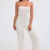 Salopetă din tricot gros cu decolteu bandeau și pantaloni evazați, culoare crem Salopetă din tricot gros cu decolteu bandeau și pantaloni evazați, culoare crem