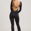 Salopetă Eulalie din jersey elastic cu detaliu fundă, în culoarea neagră Salopetă Eulalie din jersey elastic cu detaliu fundă, în culoarea neagră