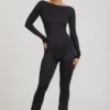 Salopetă Eulalie din jersey elastic cu detaliu fundă, în culoarea neagră Salopetă Eulalie din jersey elastic cu detaliu fundă, în culoarea neagră