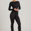 Salopetă Eulalie din jersey elastic cu detaliu fundă, în culoarea neagră Salopetă Eulalie din jersey elastic cu detaliu fundă, în culoarea neagră