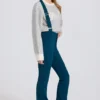 Salopetă impermeabilă cu talie înaltă și bretele, de culoare verde-albăstrui Salopetă impermeabilă cu talie înaltă și bretele, de culoare verde-albăstrui