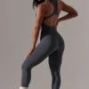 Salopetă lungă cu decupaje, de culoare gri Salopetă lungă cu decupaje, de culoare gri