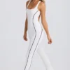 Salopetă Petite Soft Active cu spate decupat, în culoarea alb Salopetă Petite Soft Active cu spate decupat, în culoarea alb