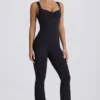 Salopetă Soft Active cu decupaj la spate, în culoarea negru Salopetă Soft Active cu decupaj la spate, în culoarea negru