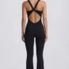 Salopetă Soft Active cu decupaj la spate, în culoarea negru Salopetă Soft Active cu decupaj la spate, în culoarea negru