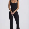 Salopetă Soft Active cu decupaj la spate, în culoarea negru Salopetă Soft Active cu decupaj la spate, în culoarea negru