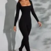 Salopeta Delanie cu guler pătrat și mâneci lungi, în negru Salopeta Delanie cu guler pătrat și mâneci lungi, în negru