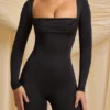 Salopeta Elvina Petite din jersey elastic, cu guler înalt, în negru Salopeta Elvina Petite din jersey elastic, cu guler înalt, în negru