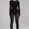Salopeta Irina din tricot fără cusături, cu mâneci lungi, în culoarea neagră Salopeta Irina din tricot fără cusături, cu mâneci lungi, în culoarea neagră