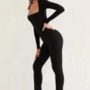 Salopeta Jett cu mâneci lungi și guler pătrat, în culoarea negru Salopeta Jett cu mâneci lungi și guler pătrat, în culoarea negru